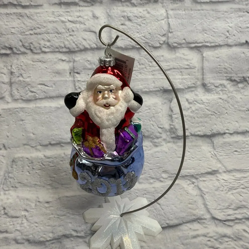 Celebrations Radko 2014 Blown Glass Ornament Santa in Present Bag w/ tags
